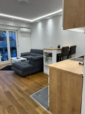 a living room with a couch and a table at Apartment, Stari Grad, Belgrade in Belgrade