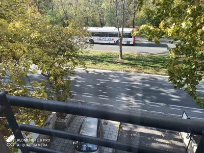 an overhead view of a bus on a city street at Bulevar Star Apartment in Belgrade