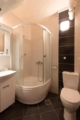 a bathroom with a shower and a toilet at Apartman 22 in Belgrade