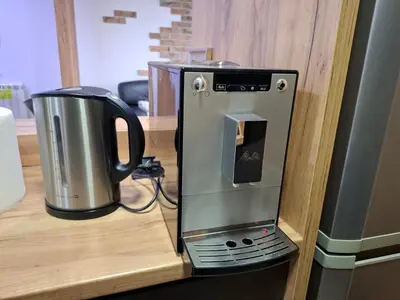 a coffee maker sitting on top of a counter at Serbian home - 44, Gandijeva 184, free parking in Bežanija