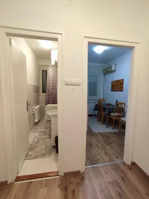 an open door to a room with a living room at Apartment Kaja in Belgrade