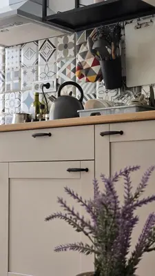 a kitchen with a counter with a sink and a stove at Apartment Major in Belgrade