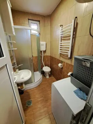 a small bathroom with a toilet and a sink at Apartmani MilaMi #1 in Belgrade
