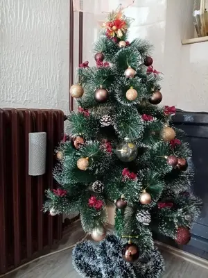 a christmas tree with ornaments on it at Apartment Anna in Belgrade