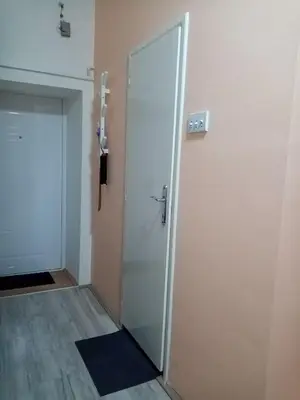 a door leading into a room with a hallway at Apartment Anna in Belgrade