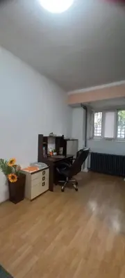an empty room with a desk and a chair at Apartment Anna in Belgrade