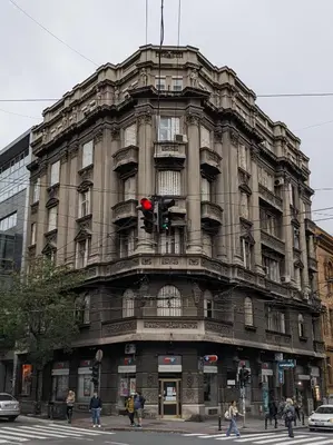 a building with a red traffic light in front of it at Danka in Belgrade