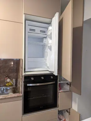 an empty refrigerator with its door open in a kitchen at Danka in Belgrade