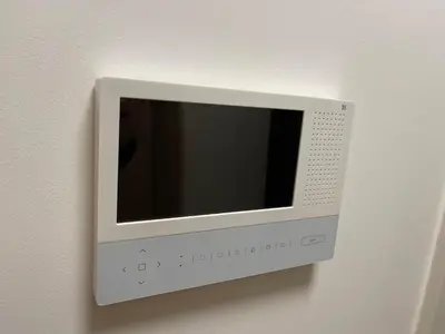 a microwave mounted on a wall in a room at Downtown in Belgrade