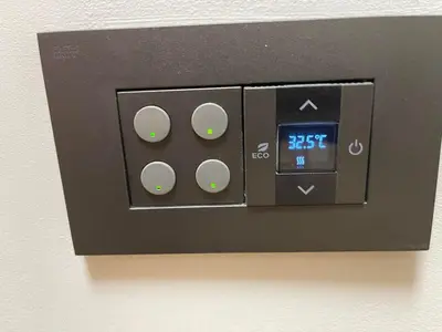 an electrical outlet with a clock on the wall at Downtown in Belgrade