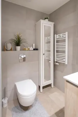 a bathroom with a toilet and a sink at Beograd na vodi - BW ViSTA LUXURY in Belgrade