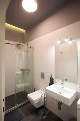 a bathroom with a sink and a shower and a toilet at Studio 10 in Belgrade