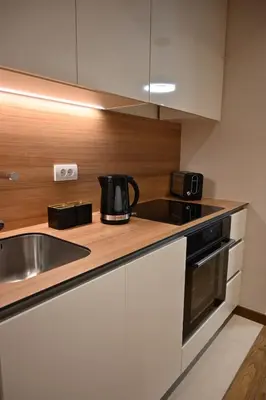a kitchen with a sink and a counter top at BW Sky View, 23rd Floor, Belgrade Waterfront in Belgrade