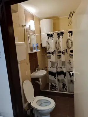 a bathroom with a toilet and a sink at Sleep&Go in Belgrade