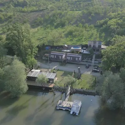 an aerial view of a house in the water at Bora kuće na reci in Belgrade