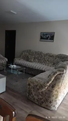 a living room with a couch and a coffee table at Centar_park in Arandjelovac