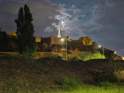 a building with a cross on top of a hill at Angelina 2 in Belgrade