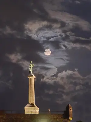 a statue on top of a monument with a moon at Angelina 2 in Belgrade