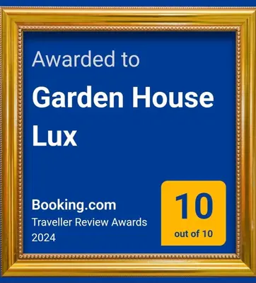 a picture frame with the text awarded to garden house luxk at Garden House Lux in Belgrade