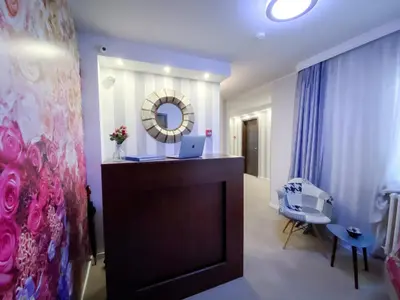 a room with a vanity with a laptop on it at Luka de Luka Suites in Belgrade