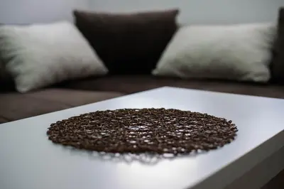 a pile of coffee beans sitting on top of a table at Sobe i Apartmani Casa Mia in Pećinci