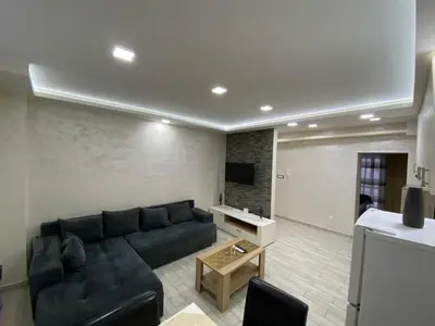 a living room with a couch and a table at Daca 1 in Belgrade