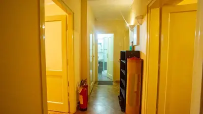 a hallway with a room with a fire hydrant and a refrigerator at Private cozy room 1 with shared kitchen in appartment, downtown Belgrade in Belgrade