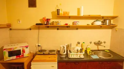 a kitchen with a sink and a counter top at Private cozy room 1 with shared kitchen in appartment, downtown Belgrade in Belgrade