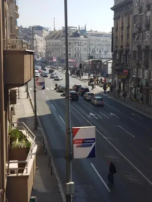a view of a city street with cars on the road at Private cozy room 2 with shared kitchen in appartment in Belgrade