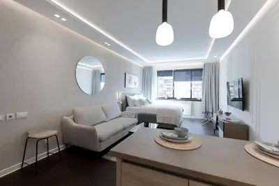a large living room with a bed and a couch at A Blok Top Living in Belgrade