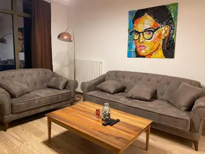 a living room with a couch and a coffee table at Aurora 21 in Belgrade