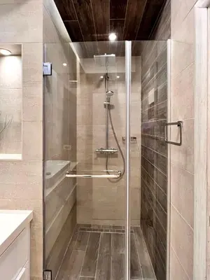 a shower with a glass door in a bathroom at Vivio 2 Luxury Apartment in Belgrade