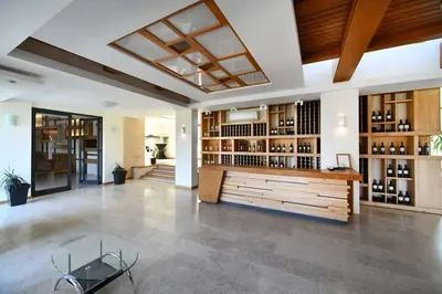 a large room with a wine cellar with a tasting room at Villa Luxury Rooms - Wine Resort in Smederevo