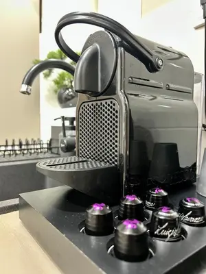 a close up of a kitchen counter with a fax machine at Paradise Museum City Center in Belgrade