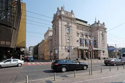 a black car parked in front of a building at Paradise Museum City Center in Belgrade