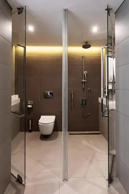 a bathroom with a shower and a toilet at Crowne Plaza Belgrade by IHG in Belgrade