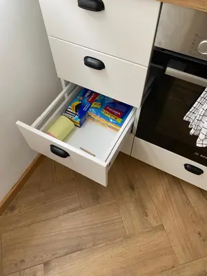 a drawer in a cabinet with some food in it at Hidden Gem in Belgrade