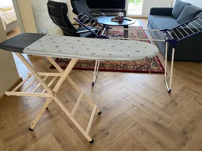 a ping pong table in a living room at Hidden Gem in Belgrade