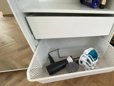 a drawer with a flashlight and other items in it at Hidden Gem in Belgrade
