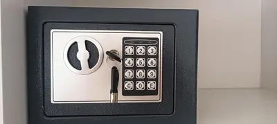 a black and white remote control on a wall at Apartman Blagojevic Hill in Arandjelovac
