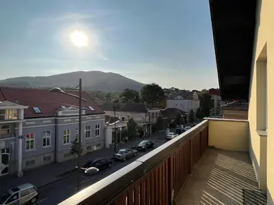 a balcony with a view of a street with cars at Apartman Stojanović in Arandjelovac