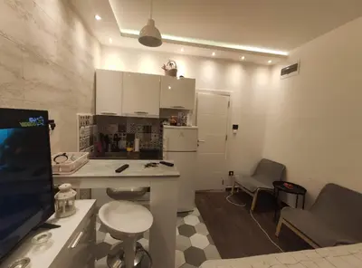 a small kitchen with a desk and a counter top at Zone Vidikovac in Belgrade