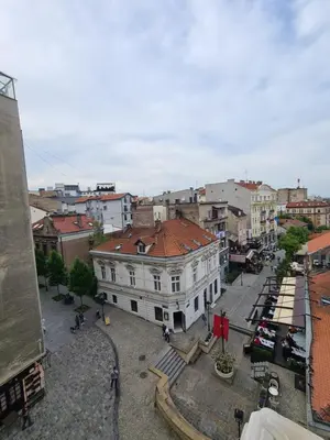 an overhead view of a city with a white building at Heart of Belgrade Skadarlija Apartment in Belgrade