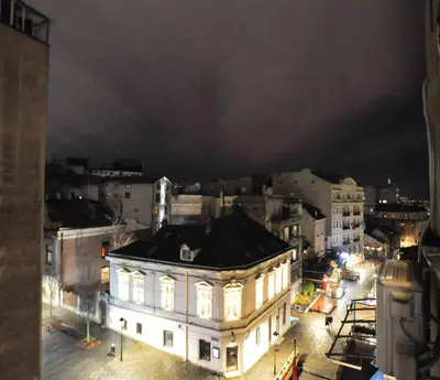 a view of a building in a city at night at Heart of Belgrade Skadarlija Apartment in Belgrade