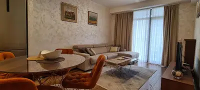 a living room with a couch and a table at Premium NB Apartment - Belgrade Waterfront in Belgrade