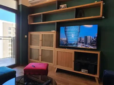 a living room with a flat screen tv at AparTwentyOne - Your Home in Belgrade in Belgrade