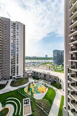 an aerial view of a building with a playground at Belgrade Waterfront Bramar in Belgrade