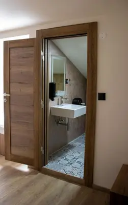 a bathroom with a sink and a mirror at ELEVENROOMS in Belgrade