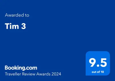 a screenshot of a phone screen with the text upgraded to tim travelling review awards at Tim 3 in Belgrade