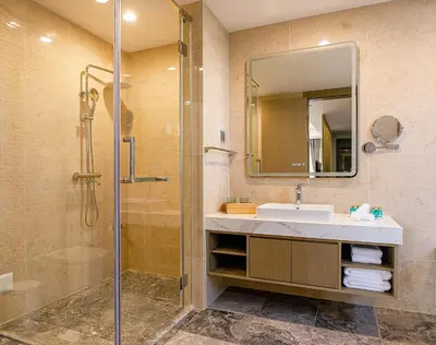 a bathroom with a sink and a shower at LDS Hotel Belgrade in Belgrade